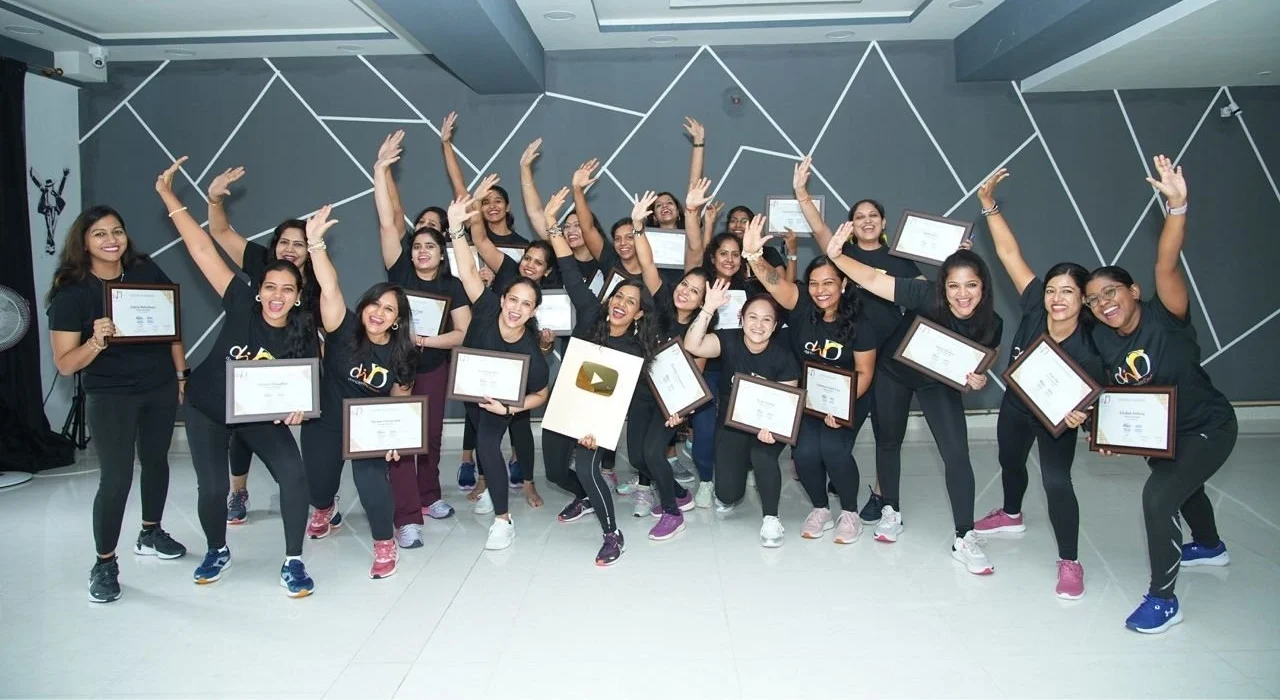 DWD certified trainers with their certificates and the YouTube Gold Play Button